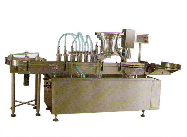 GX型液体灌装旋盖一体机.jpg GX型液体灌装旋盖一体机.jpg